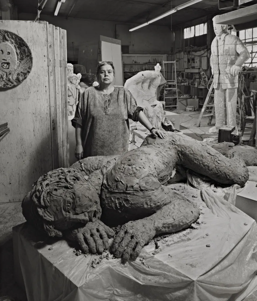 Viola Frey with Untitled (Prone Man) at her 1089 Third Street studio, Oakland, 1987.