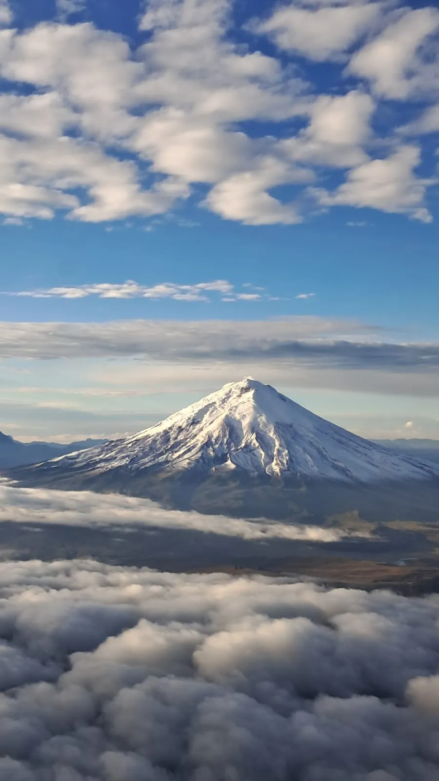Aerial snapshot of the Chimborazo, sent to Dulcina by artist Andrea Moreira, landing in Quito on March 31, 2026