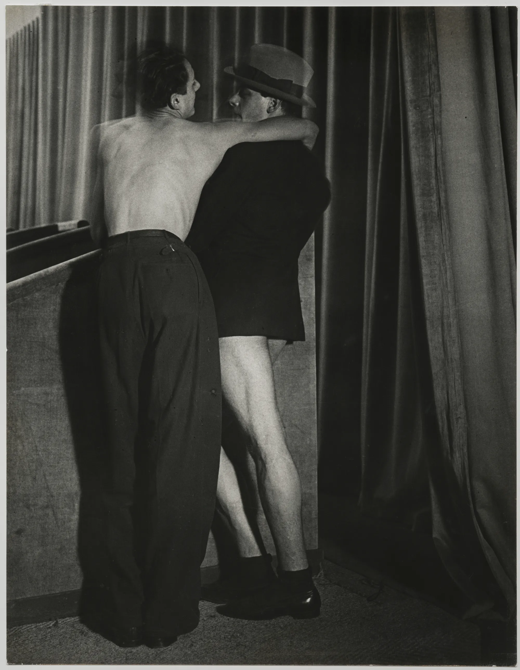 Brassaï (Gyula Haláz), Young Couple Wearing a Two-in-One Suit at the Bal de la Montagne Sainte-Genevieve, c. 1931
