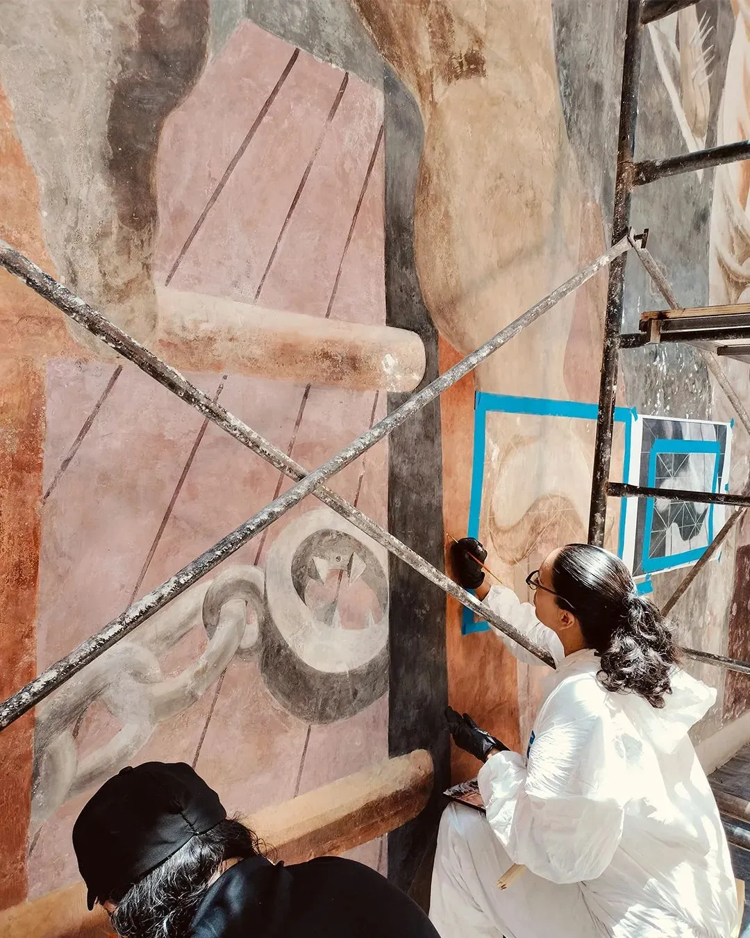 Detail of mural ‘The Struggle Against Terrorism,’ 1935 during restoration. Photo: Museo Regional Michoacano, Morelia, Mexico