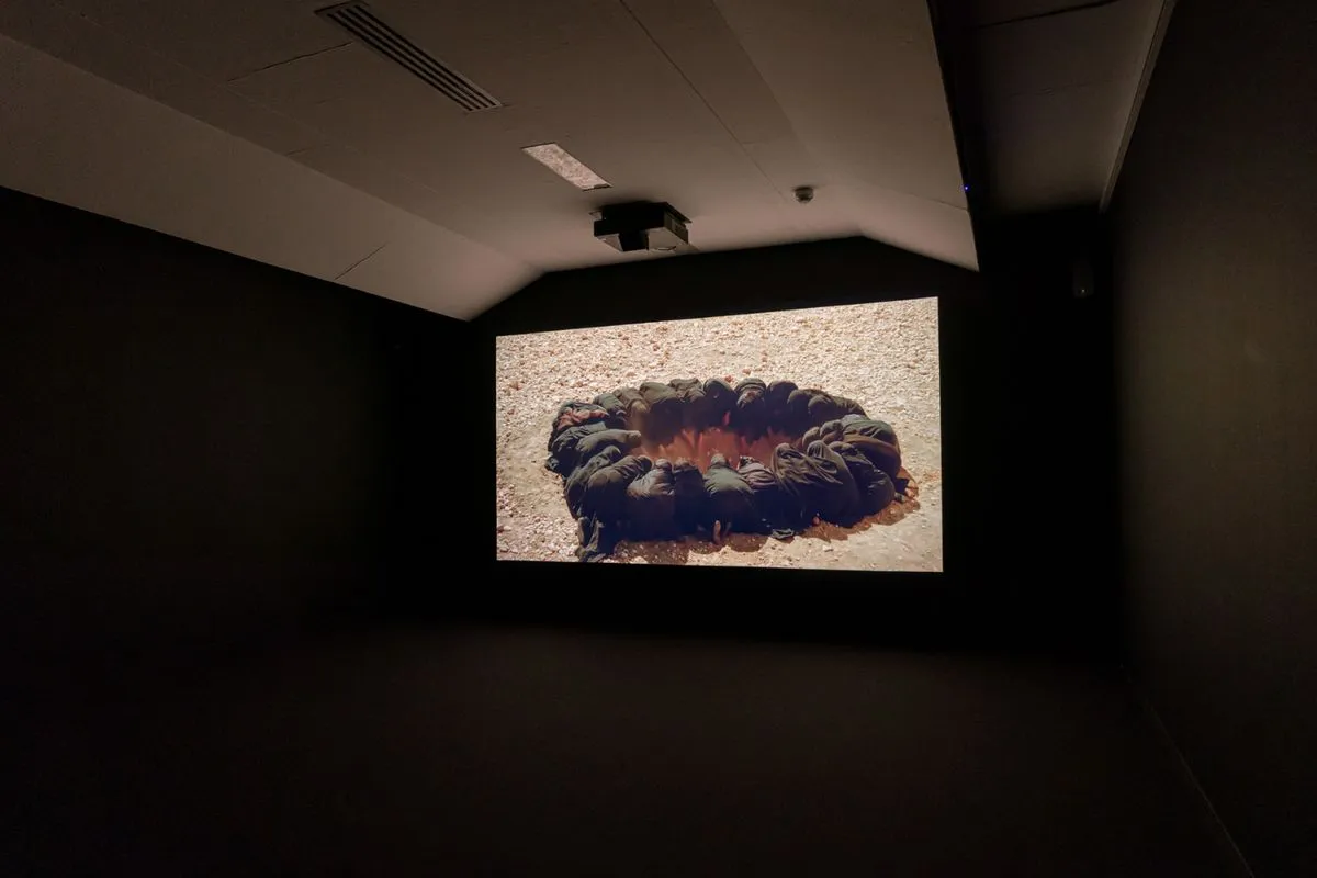 Installation view of Shirin Neshat's Body of Evidence at PAC Padiglione d'Arte Contemporanea