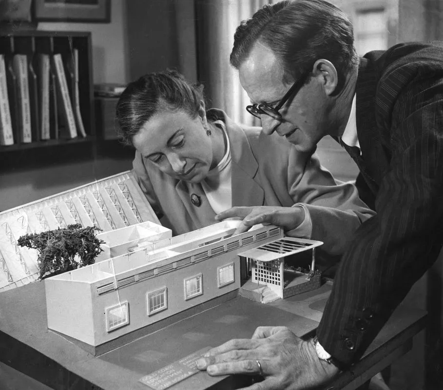 Jane Drew and Maxwell Fry with a model of one of their many buildings for the Gold Coast, 1945. Image courtesy of RIBA