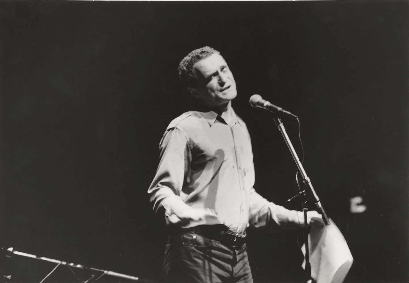 John Giorno reading at Centre Pompidou. Paris, France, Jun 10 1983, Photo by Francoise Janicot