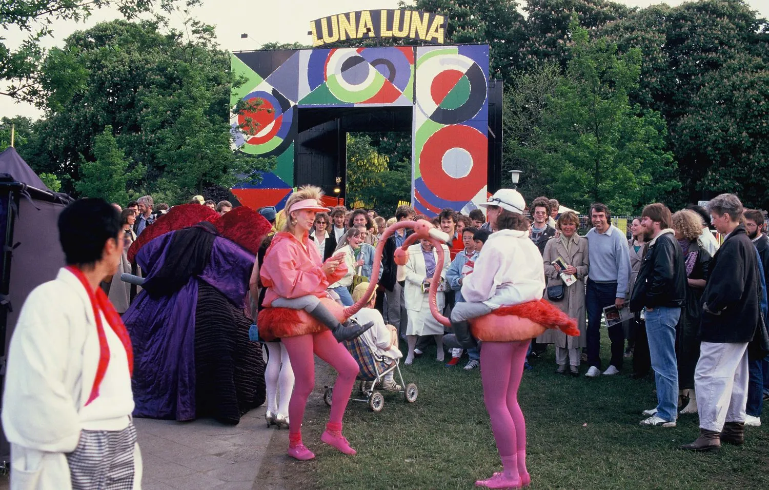 Performers in front of Sonia Delaunay’s entrance archway and Luna Luna sign. Luna Luna, Hamburg,
Germany, 1987